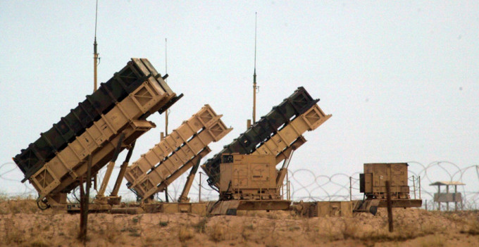 A BATTERY OF U.S MANNED PATRIOT MISSILES PROTECT A NEARBY BRITISH AND U.S AIRBASE IN KUWAIT